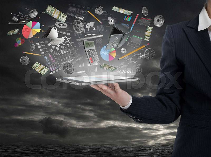 Businnes concept. Woman hand hold tablet pc with elements of business in the light, stock photo