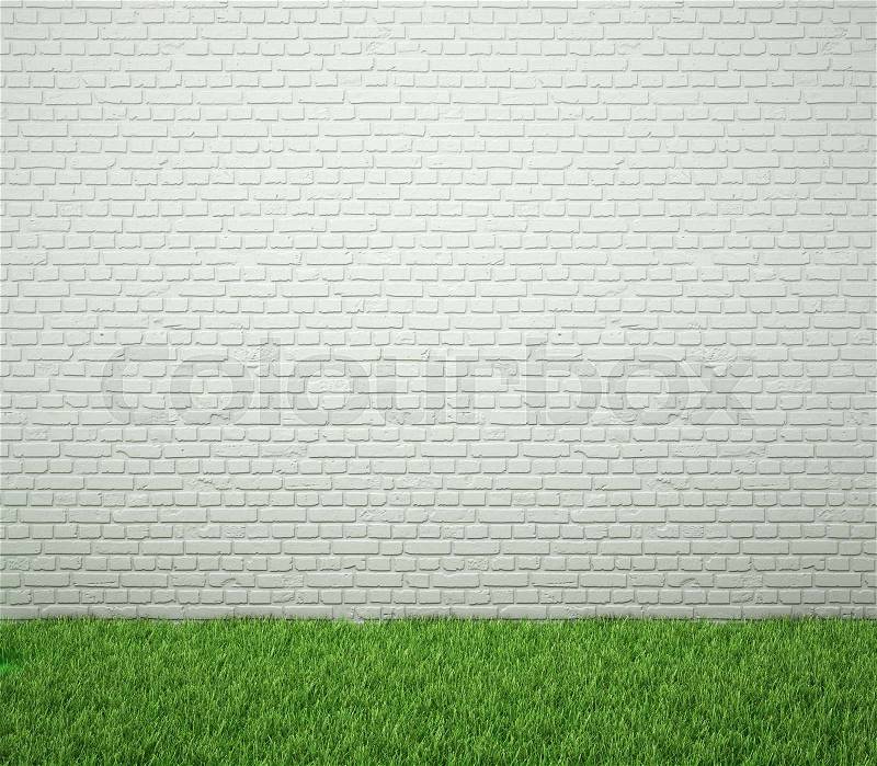 Brick wall with green grass. Blank for drawing, stock photo