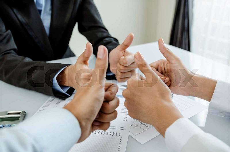 Group of business people show thumb up, stock photo