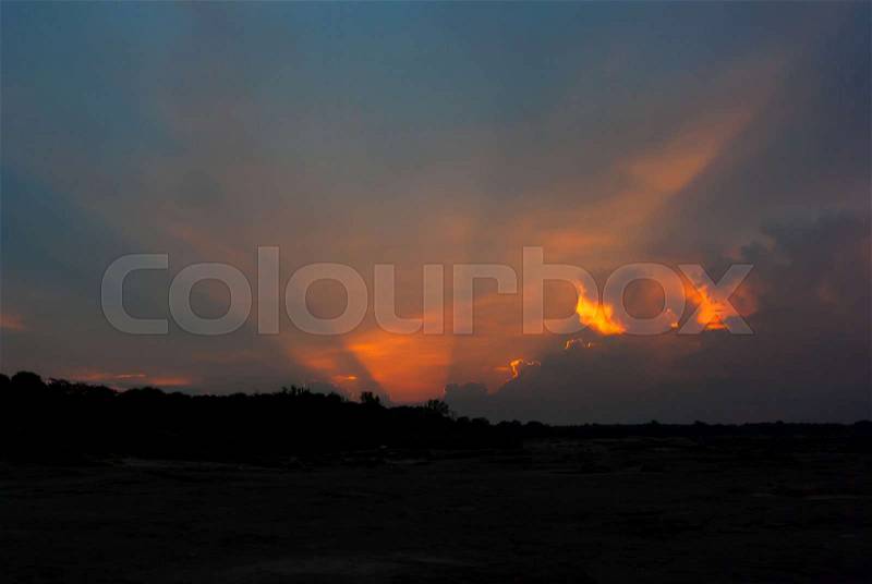 Sun ray with clouds on the sky at twilight time background, stock photo