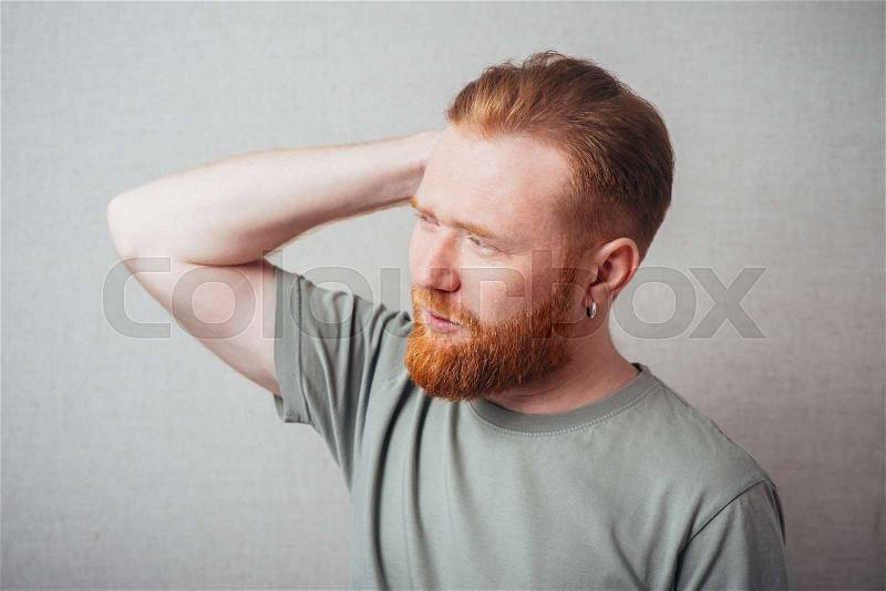 Portrait of the thinking red man , stock photo