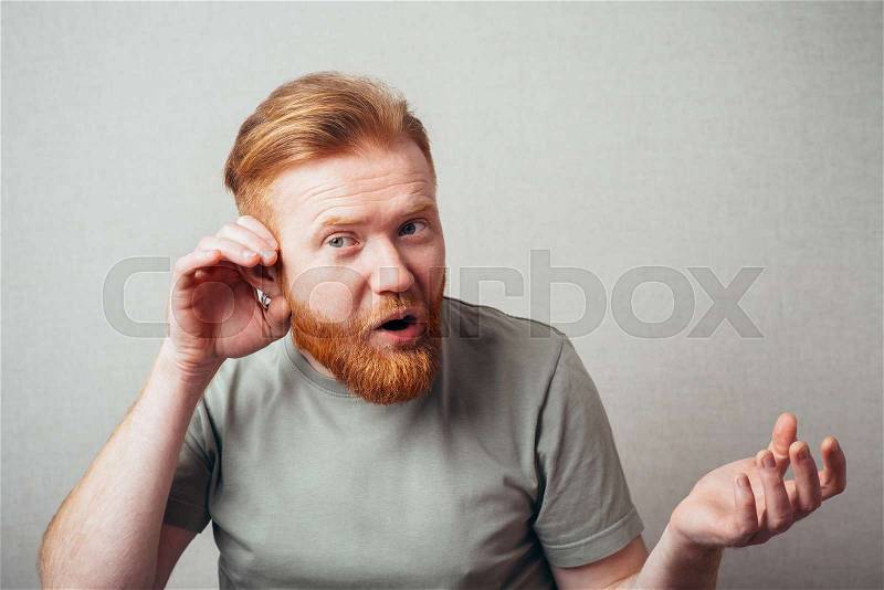 Red man overhears, stock photo