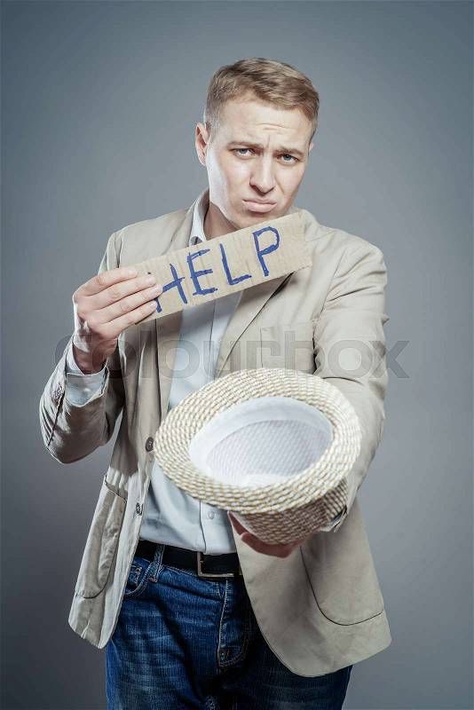 Man hold in hand hat to donate and a card help, stock photo