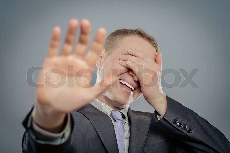 Man has lifted hand and gesture has shown - it is impossible photograph, stock photo