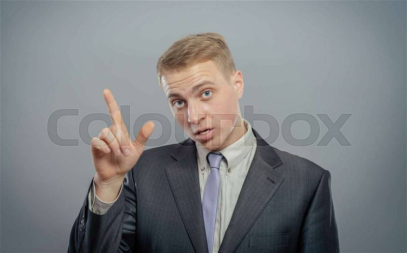 Business man pointing up finger isolated , stock photo