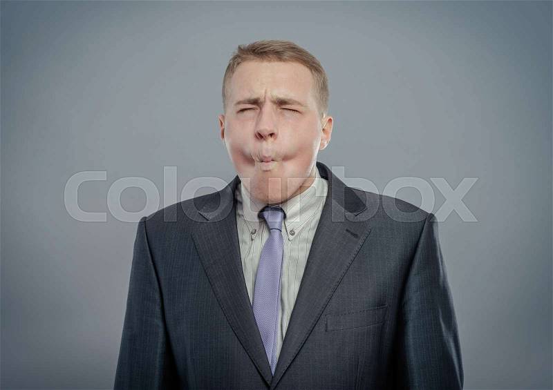 A real funny face with close eyes captured in high detail, stock photo