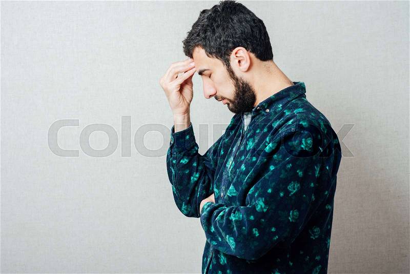 Portrait of young man worrying, stock photo