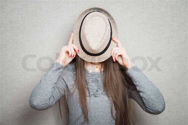 Portrait of a Beautiful Young Woman in hat. Retro Style, stock photo