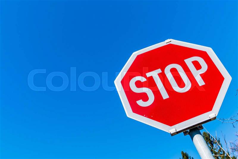 A stop sign by the roadside. photo icon for support and exit, stock photo