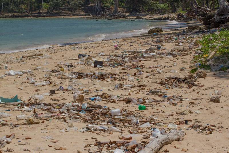 Beach on the island of Little Andaman in the Indian Ocean littered with plastic. Pollution of coastal ecosystems, natural plastic and beaches. , stock photo