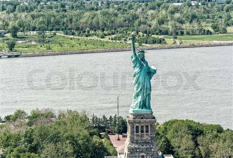 Helicopter view of Statue of Liberty, stock photo
