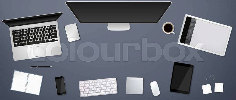 Workplace with tablet computer and mobile phone on table, stock photo