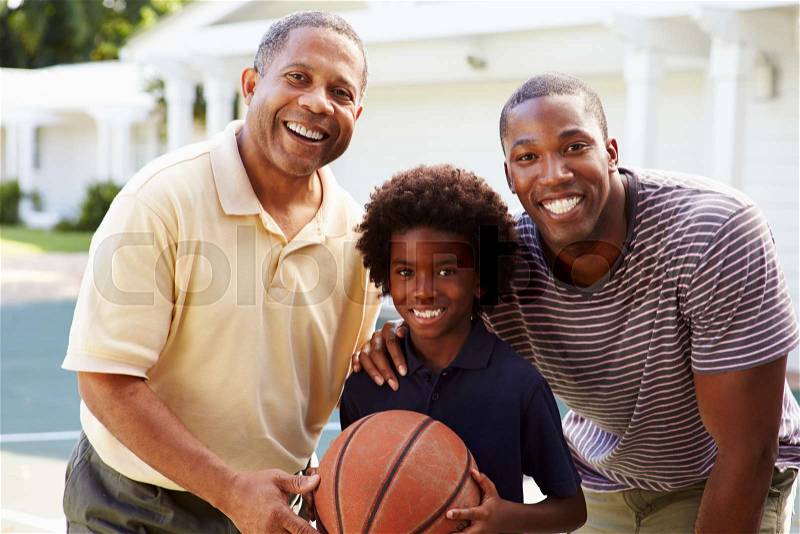 Grandfather With Son And Grandson Playing Basketball, stock photo