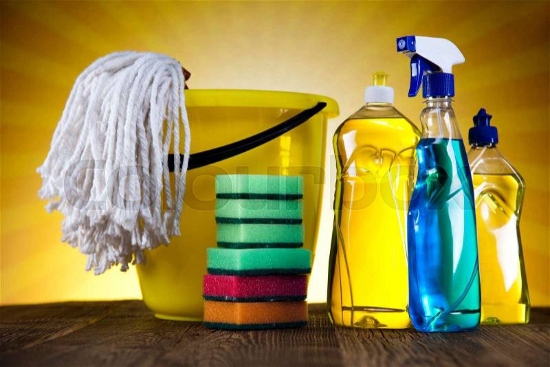 Cleaning products and sunset, home work colorful theme, stock photo