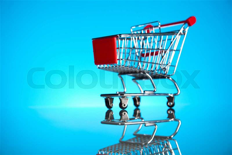 Shopping Cart Isolated On Blue, stock photo