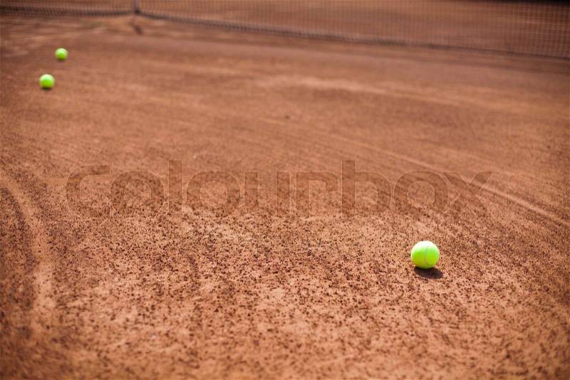 Tennis racket with tennis ball, stock photo