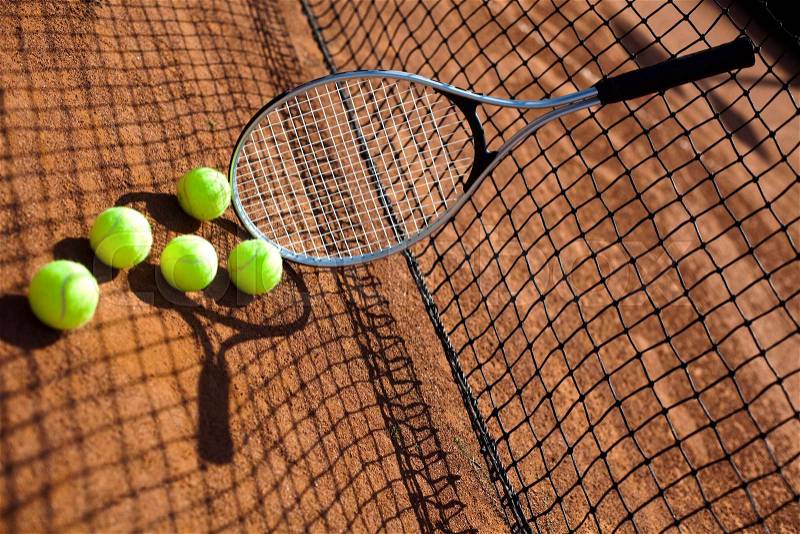 Tennis Ball on court, summertime saturated theme, stock photo