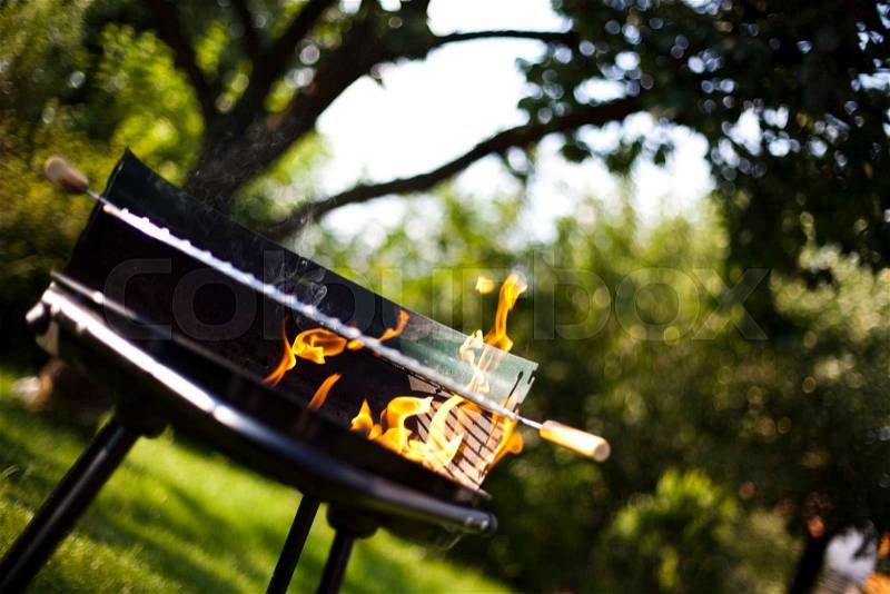 Grill flame, hot burning grill, stock photo