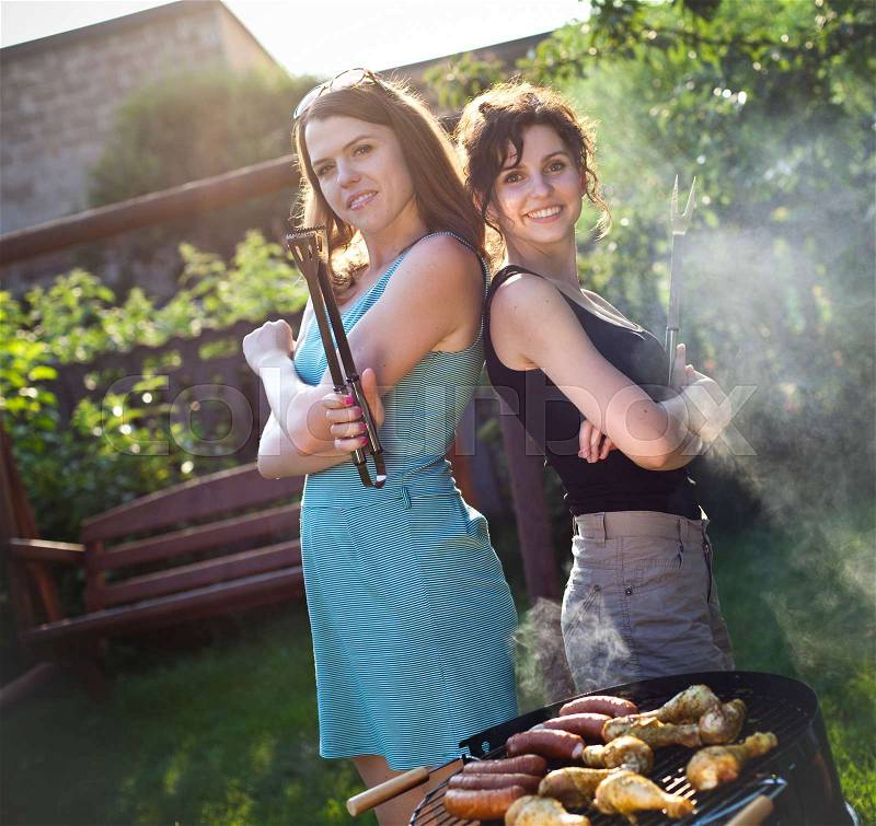 Two girls on grill, natural colorful tone, stock photo