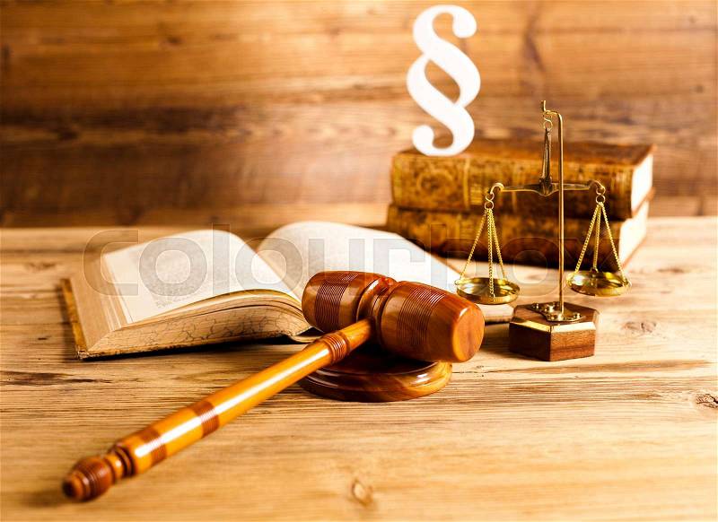 Judges wooden gavel and paragraph, stock photo