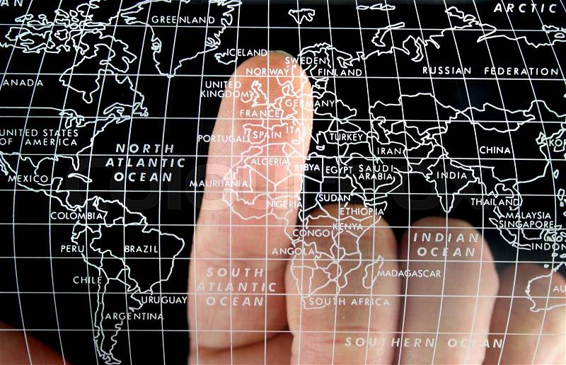 World Map finger pointing at UK, stock photo