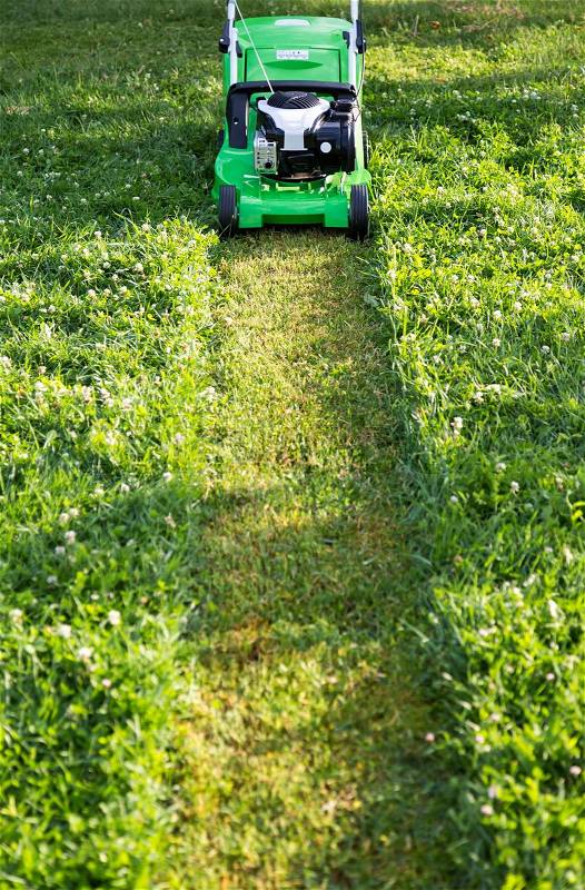 Mowing the high lawn, stock photo