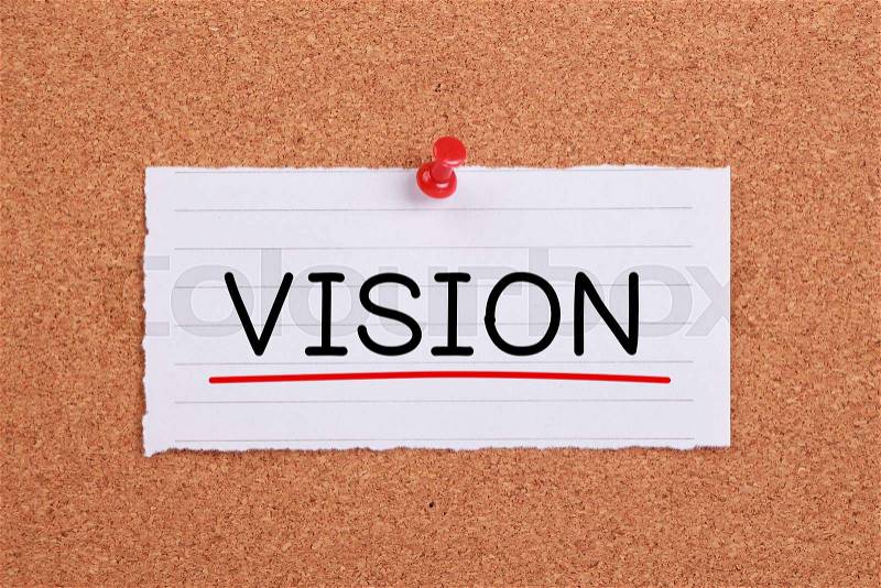 Vision concept note paper pinned on corkboard, stock photo