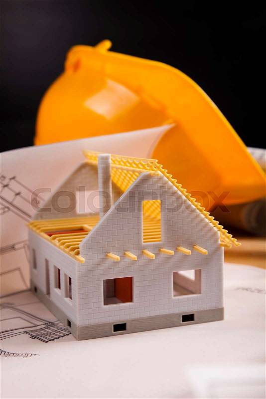 Architecture model and plans, natural colorful tone, stock photo