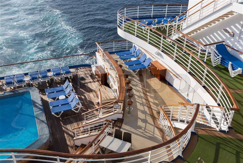 Abstract of Luxury Passenger Cruise Ship Deck, Pool and Chairs, stock photo