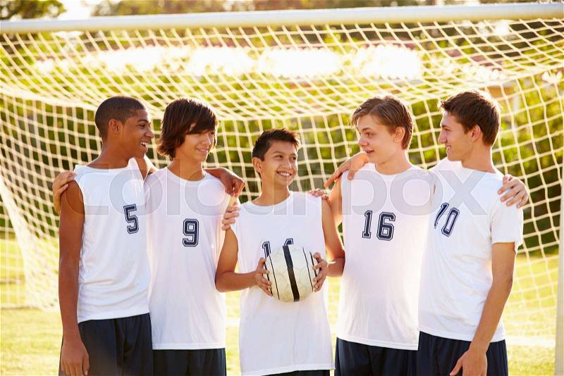 Members Of Male High School Soccer Team, stock photo