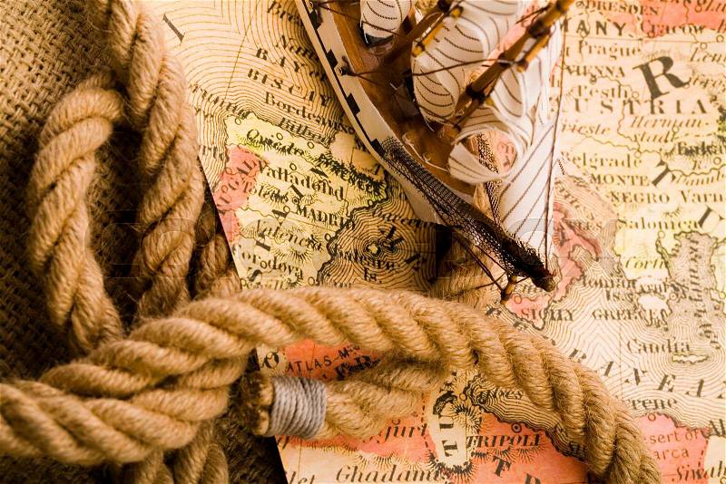 Compass on the old map background, stock photo