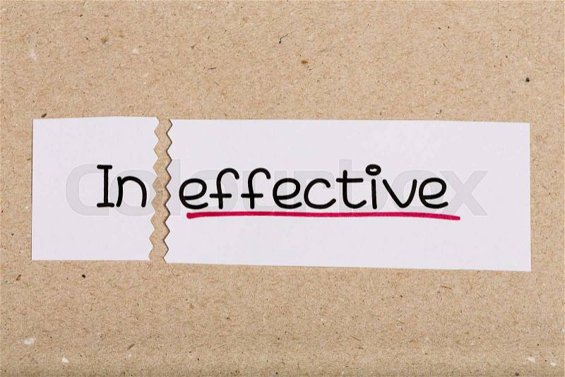 Two pieces of white paper with the word ineffective turned into effective, stock photo