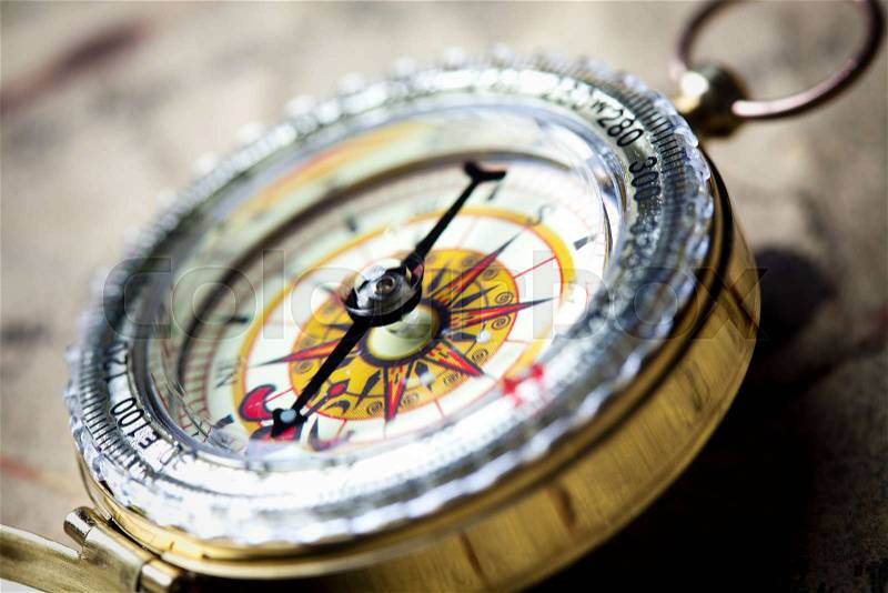 Traveling, Compass, ambient light travel theme, stock photo