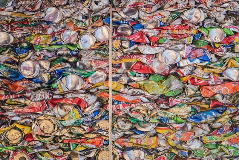 PHUKET, THAILAND - MARCH 3 : Crushed soda and beer cans at a recycling facility in Phuket on March 3, 2015. The cans will be shipped to an aluminum foundry, stock photo