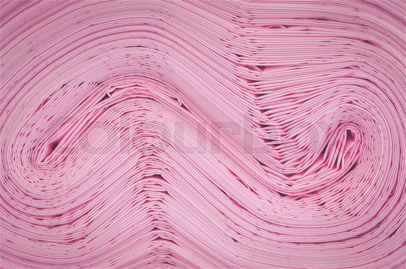 Texture of pink garbage bag roll for background, stock photo
