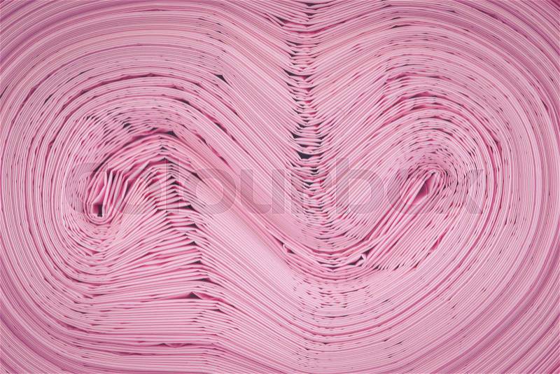 Texture of pink garbage bag roll for background, stock photo