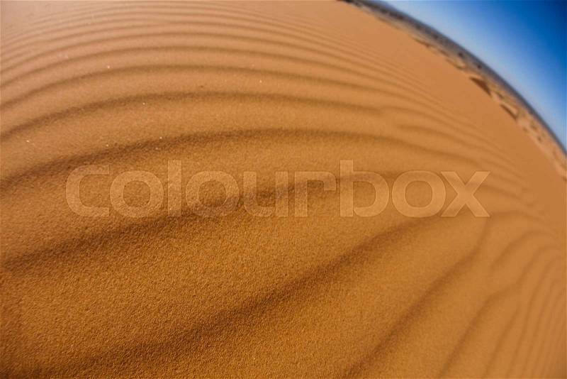 Dunes in Moroccan Sahara, colorful vibrant travel theme, stock photo