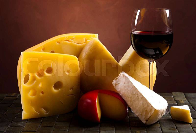 Cheese still life, saturated ambient rural theme, stock photo