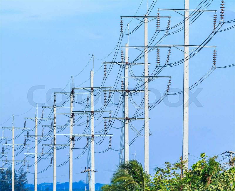 Row of wire pole electricity post, stock photo