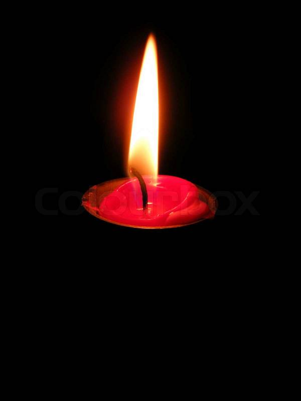 Flame of candle on black, stock photo