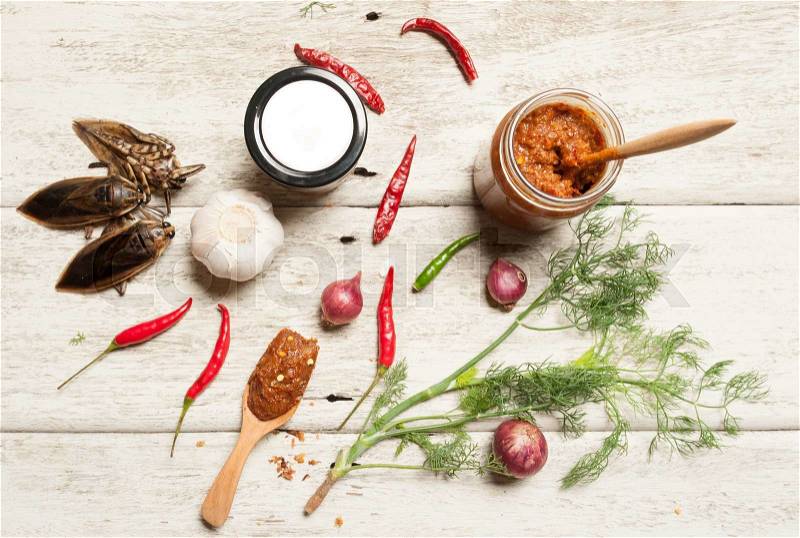 Thai kitchen food spice herb pepper grass red onion garlic chilly ginger for cooking original eastern food syle on wood, stock photo