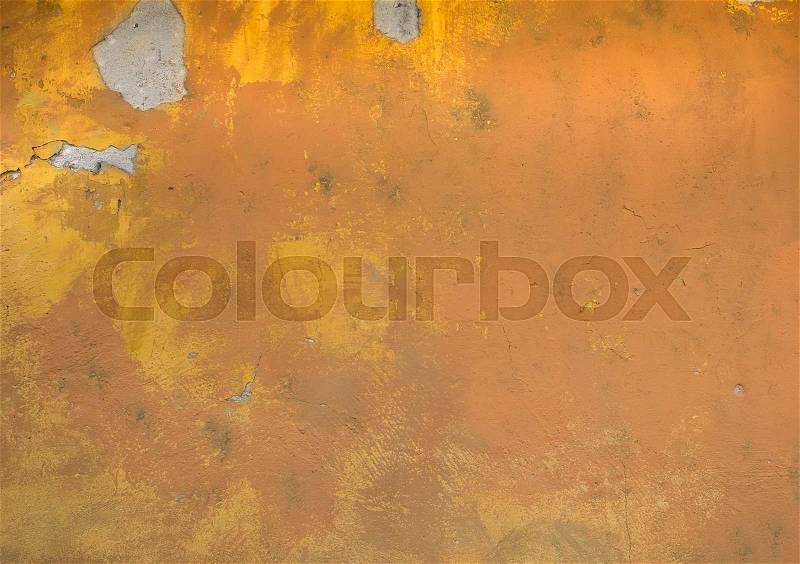 Old rustic yellow painted stone texture/background, stock photo