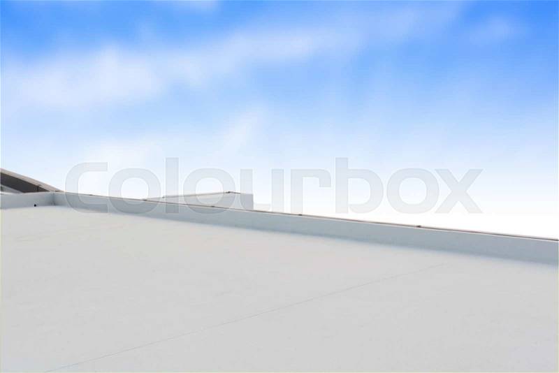 Deck or terrace on rooftop of business building and blue sky with copy space background, stock photo