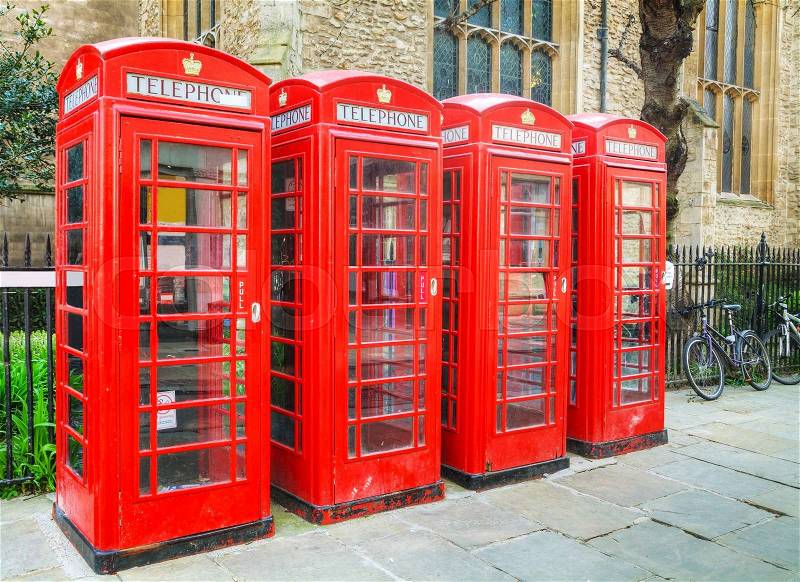Famous red telephone booths in Cambridge, UK, stock photo