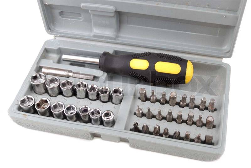 Metal screws and the manual tool for performance of works, stock photo