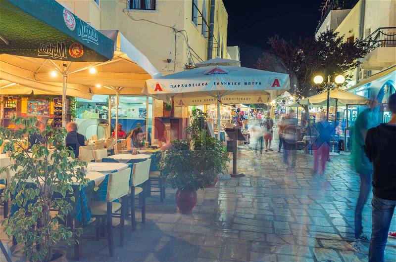 KOS, GREECE - JUNE 7, 2014: City streets at night in summer season. Kos is a preferred tourist destination in Greece, stock photo