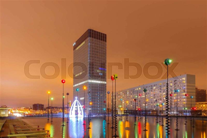 Paris, France - December 19, 2014: Defense business center west of Paris at night. Defense is the largest business district in France. Here are the major shopping centers, offices and ministries, stock photo