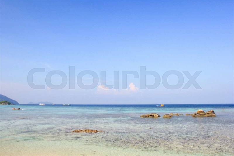 Rocks , sea and blue sky - Lipe island Thailand, stock photo