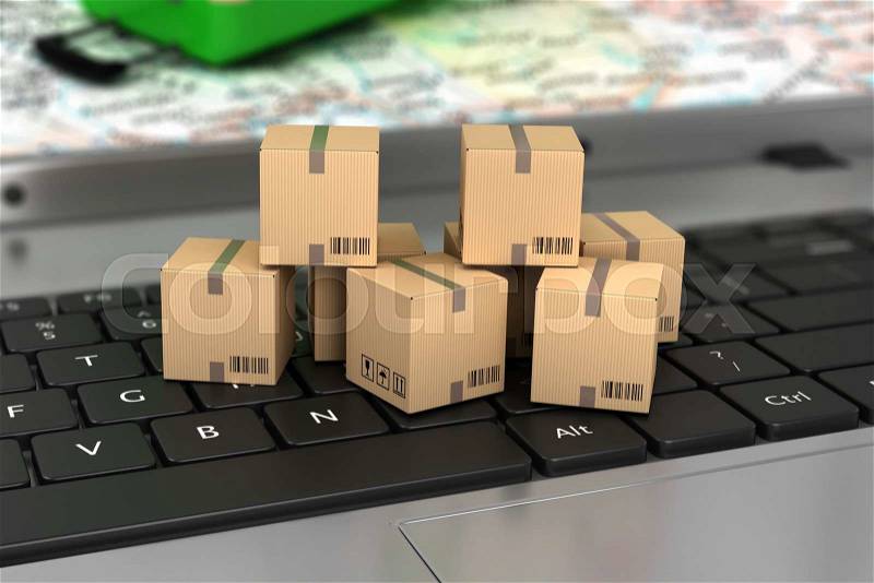 Shipping, delivery and logistics technology business industrial concept: macro view of heap of stacked corrugated cardboard package boxes on computer PC laptop notebook keyboard with selective focus, stock photo