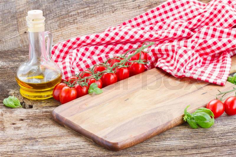 Empty cutting board on table - italian cuisine concept, stock photo